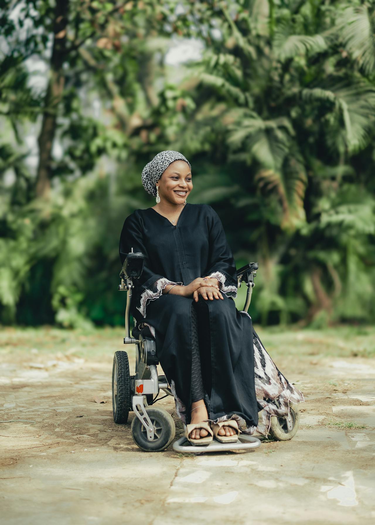 Smiling person in a wheelchair at Highfields Disability Service Pty Ltd